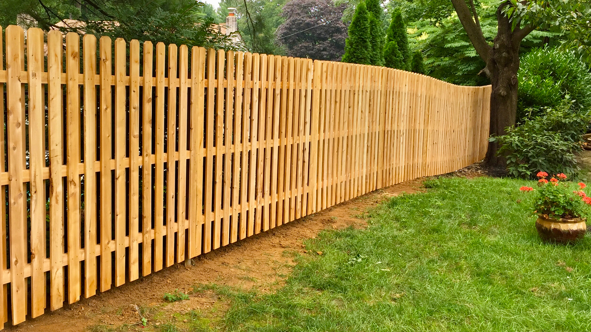 Quality wooden fence installation in a residential garden